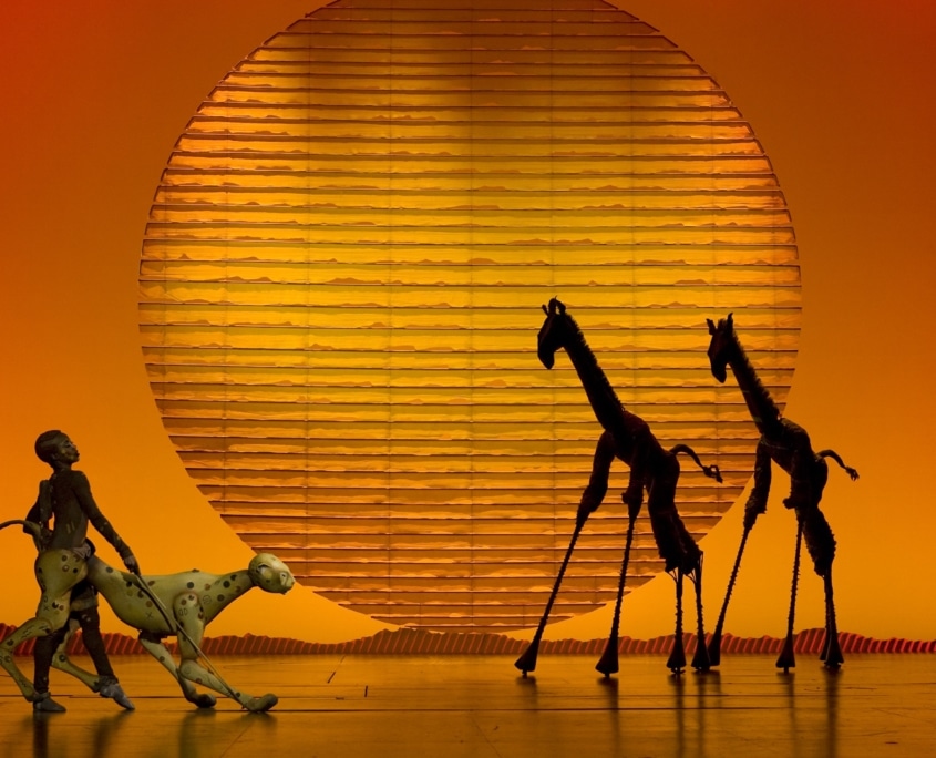 Circle of Life Cheetah and Giraffes. The Lion King. Disney. Photo by Joan Marcus